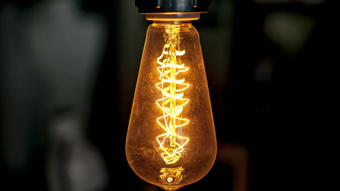 A vintage light bulb showcasing LED lighting savings in comparison to traditional bulbs.