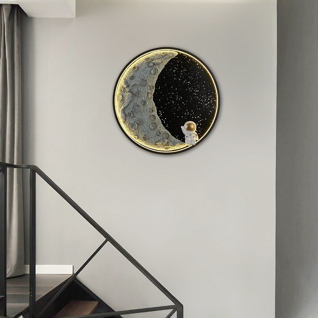 Kids room lighting guide featuring a glowing moon wall art with an astronaut for a fun decor.