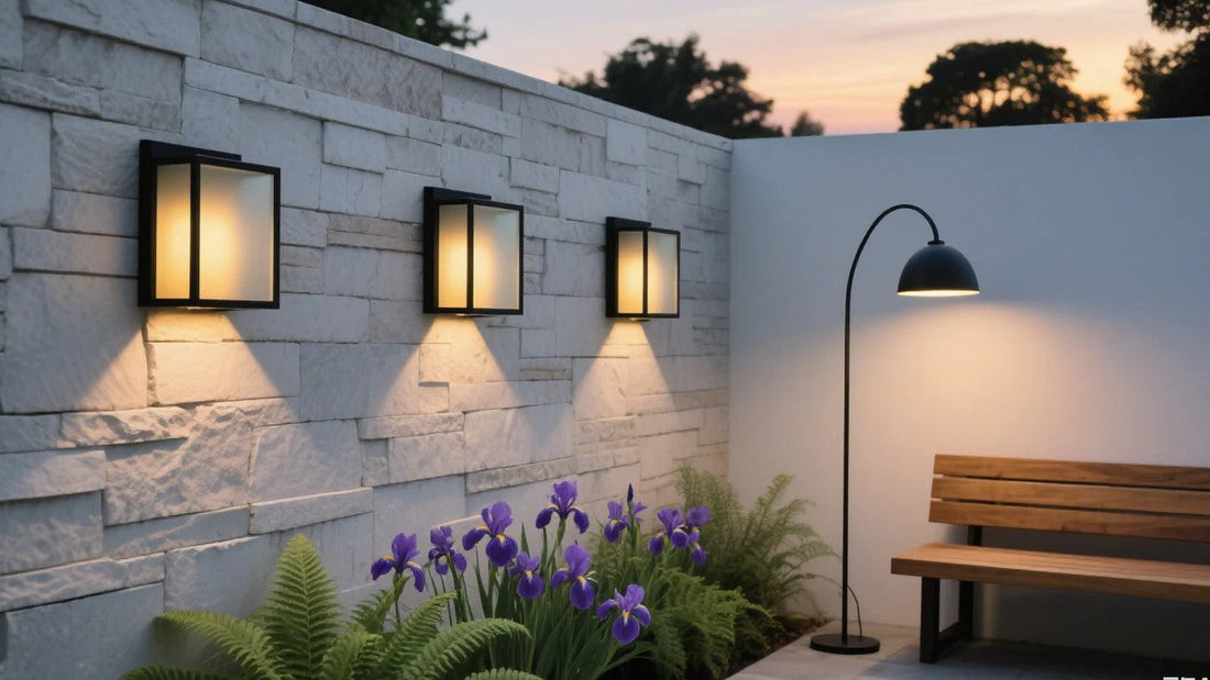Stylish garden featuring durable affordable LED outdoor lights on a stone wall with purple flowers and a wooden bench.