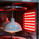 Lighting finish comparison in a baking paint process with grey lamps in an oven.