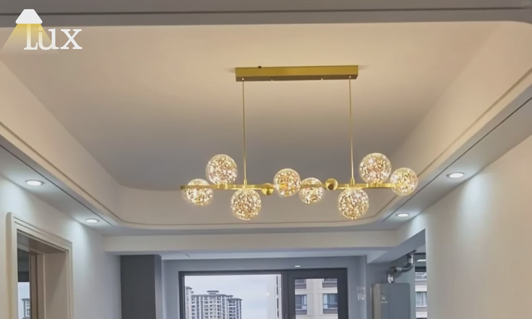 Nebula Moderner Bubble-Kronleuchter – Gold/Schwarzes Metall mit klarem Kristallglas für die Küche