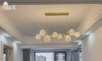 Nebula Moderner Bubble-Kronleuchter – Gold/Schwarzes Metall mit klarem Kristallglas für die Küche